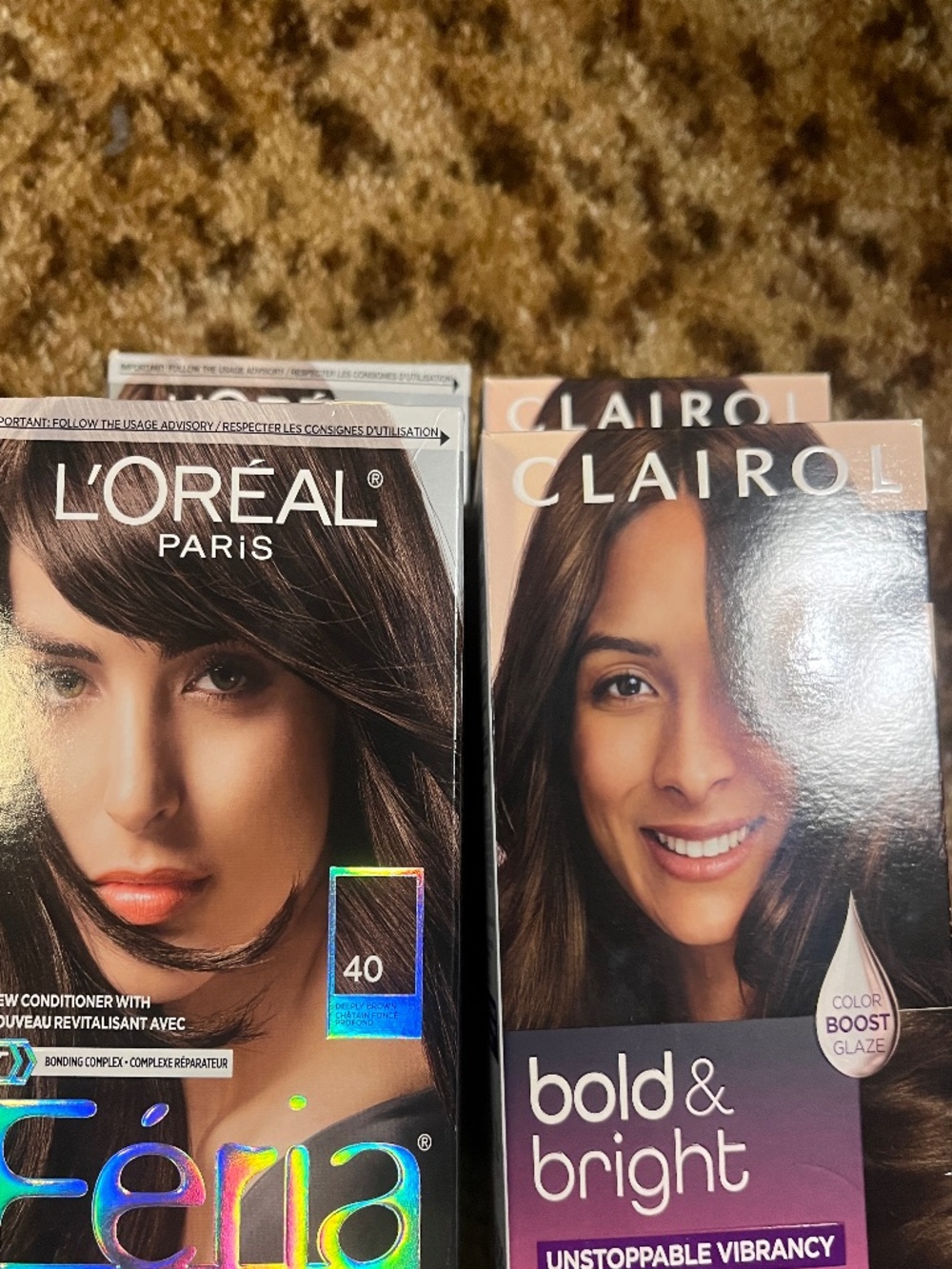 Four boxes dark brown hair dye Clairol and Feria
